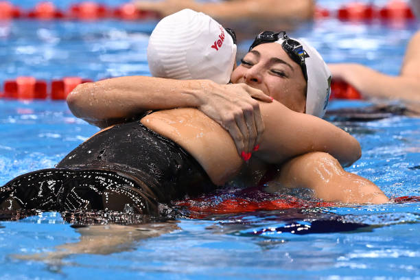 游泳比赛详细报告范文：运动员表现与赛事亮点